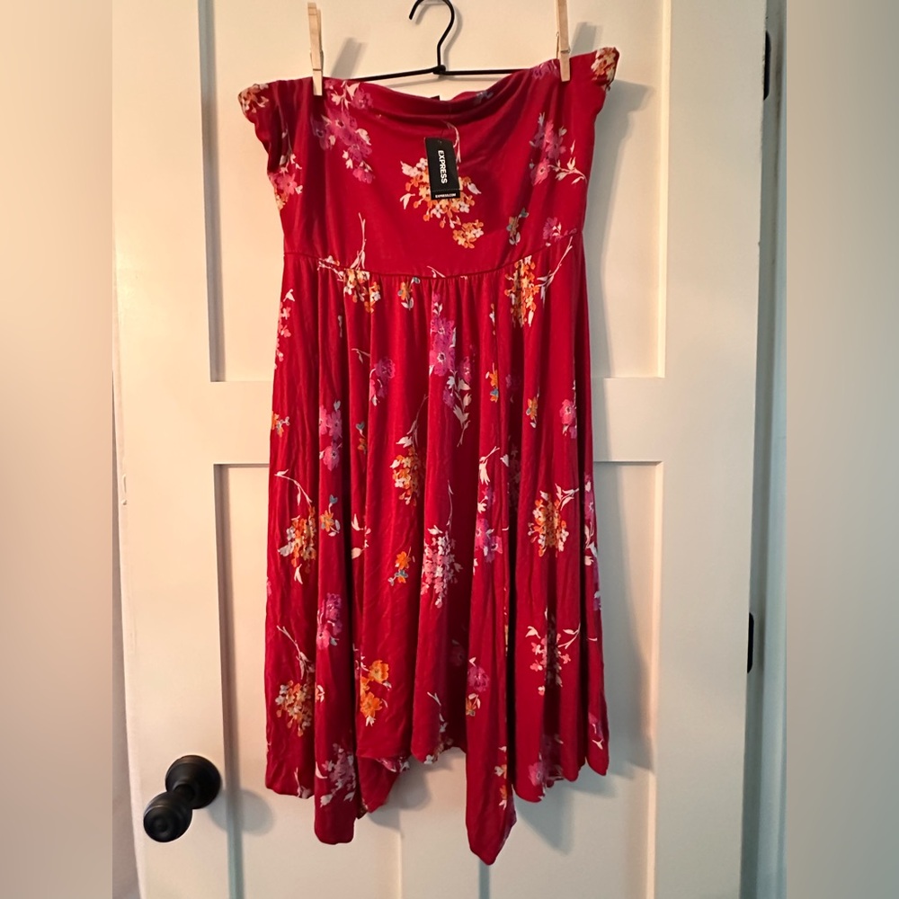 Express Mini Asymmetrical Dress
NWT
Size Large